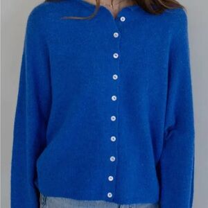 Things between cardigan large missing button